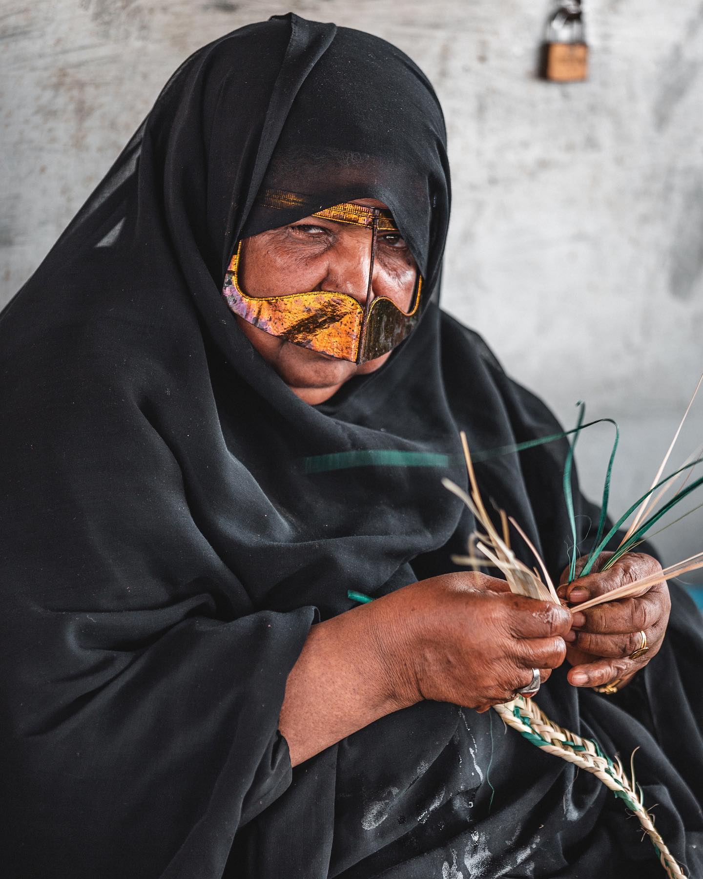 A woman at the Al Ain souk in the Abu Dhabi Emirate.  The city is a UNESCO World Heritage site and located near the border with Oman.