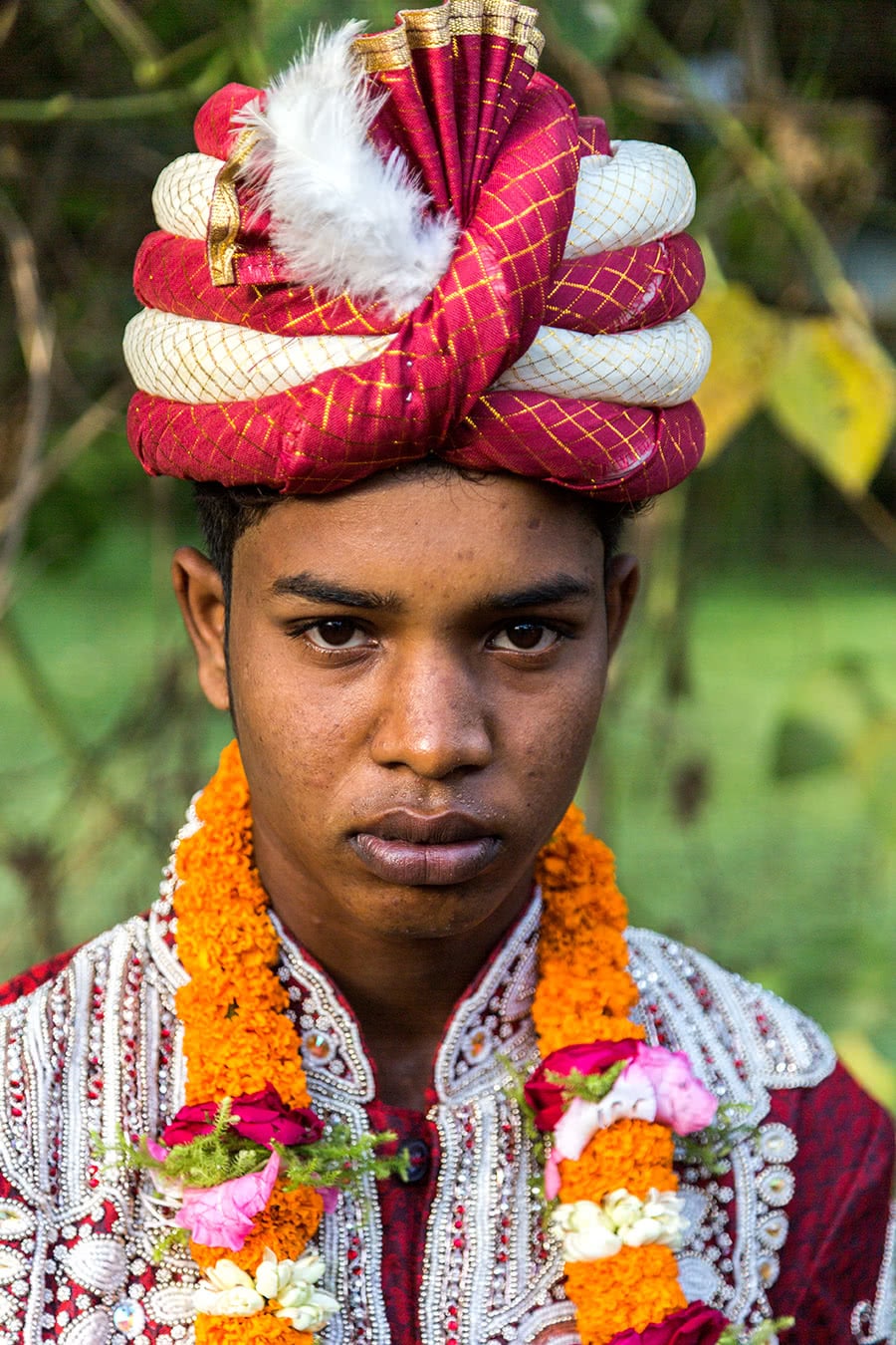 A young boy in his traditional wedding attire in Chandanaish, Bangladesh.