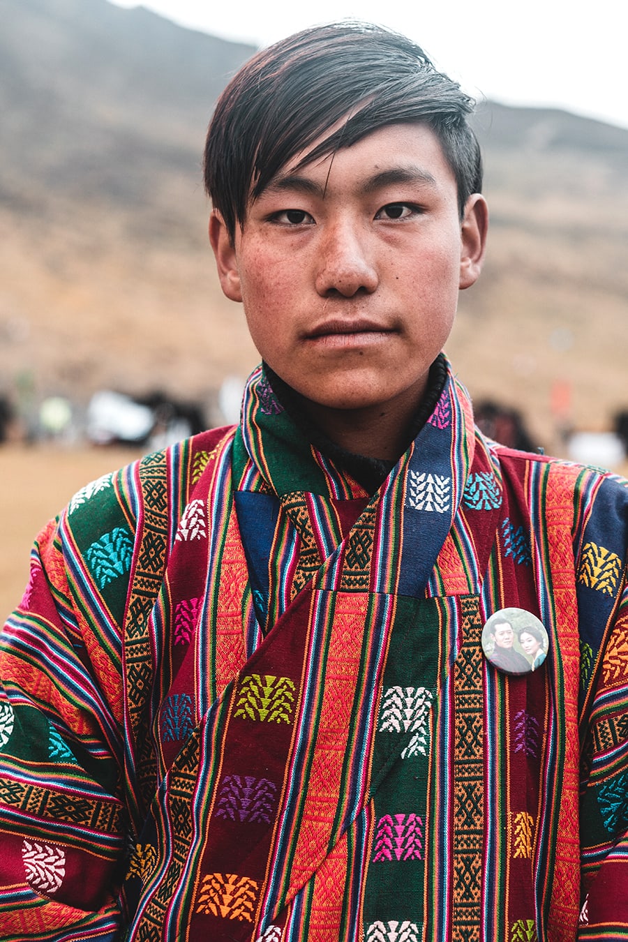 Layap boy dressed in traditional clothing for the Royal Highlander Festival in Laya, Bhutan.