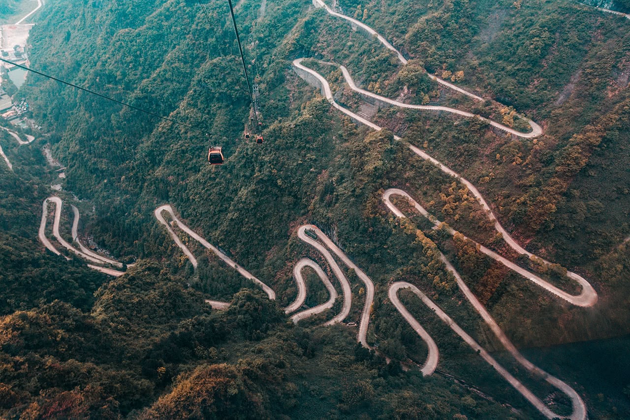 Looking down at the curvy and dangerous road leading up to Tianmen Mountain, China.
