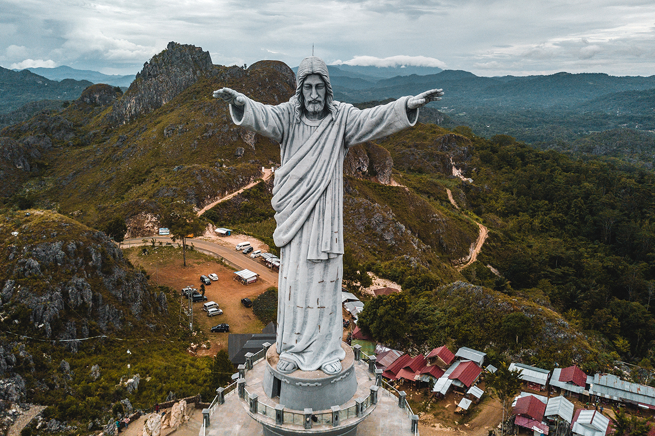 Drone photo of the largest Jesus Christ statue in the world in Tana Toraja, Indonesia.
