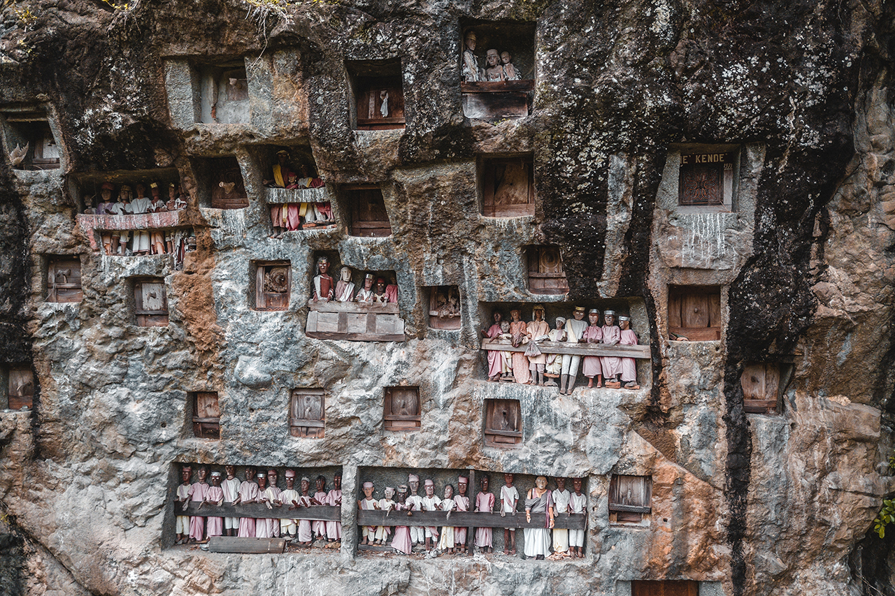 Drone view of Tau tau wooden statues representing the dead at Lemo, Tana Toraja, Indonesia.