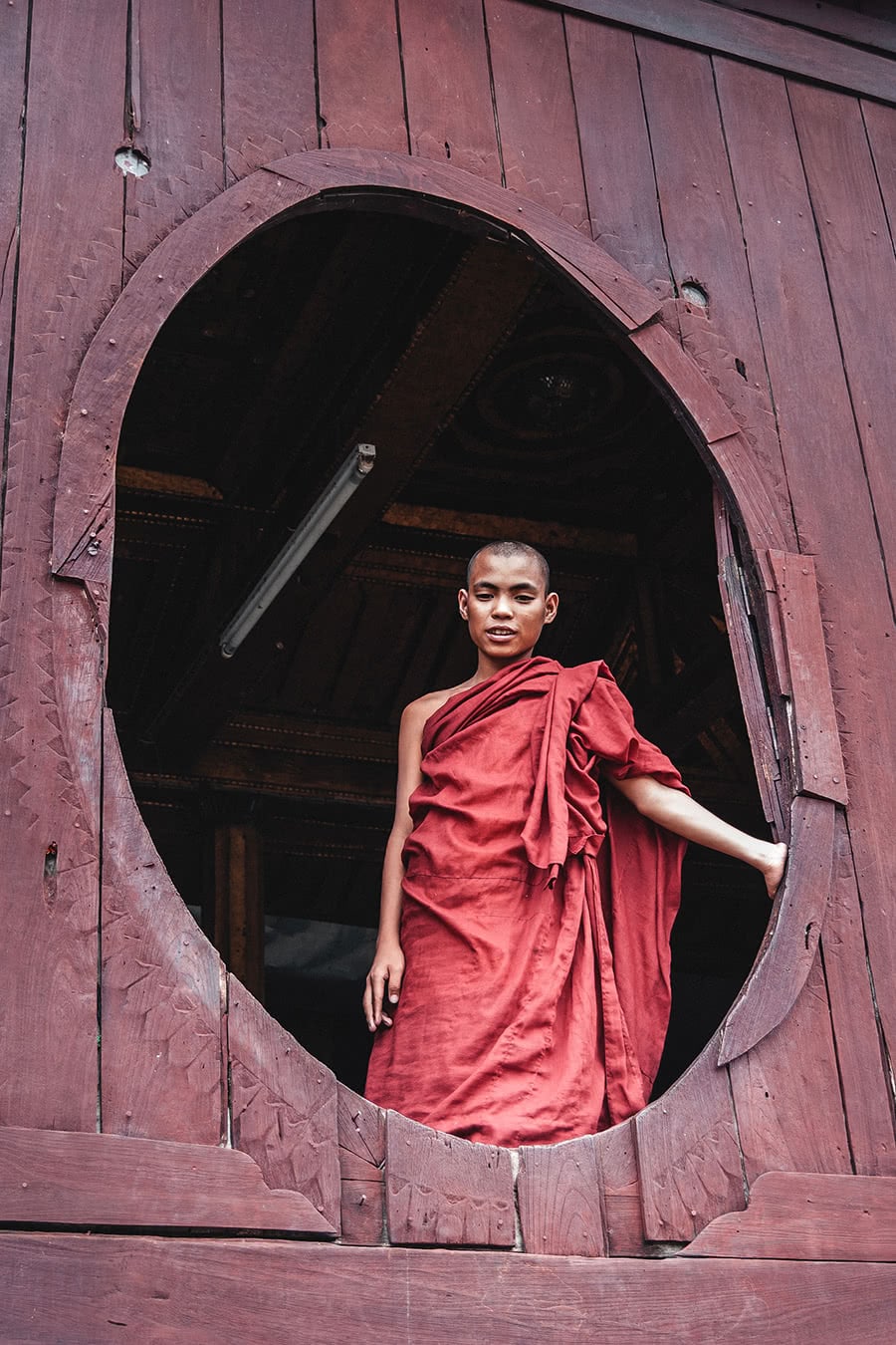 A monk at Shwe Yaunghwe Kyaung Monastery, Inle Lake.