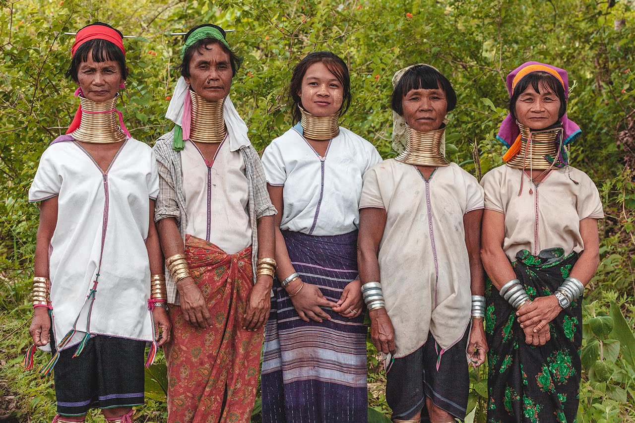 Kayan Longneck women pose as they working in their fields at Panpet village.