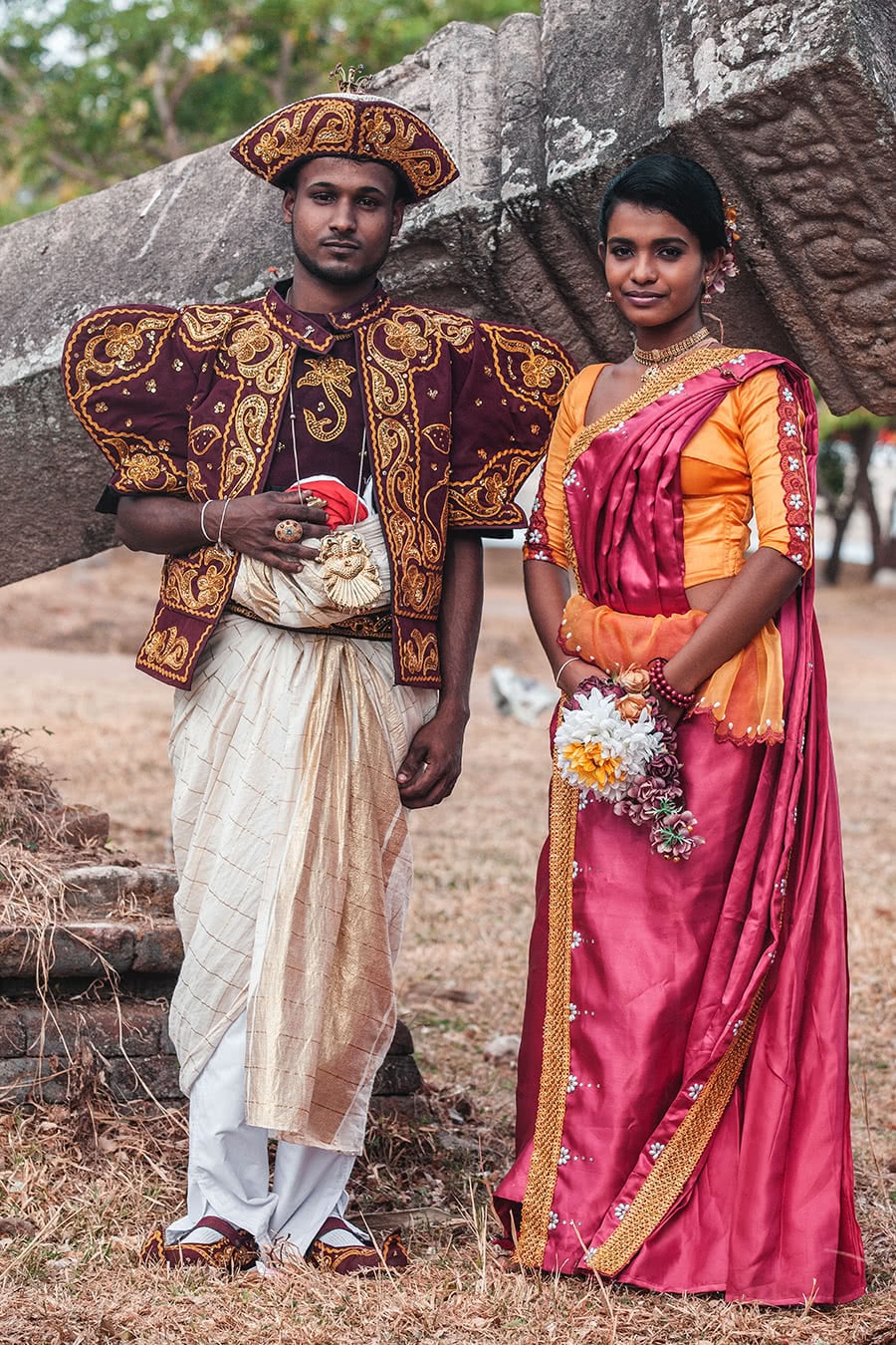 Wedding party taking photos at the ruins of Anuradhapura, Sri Lanka.