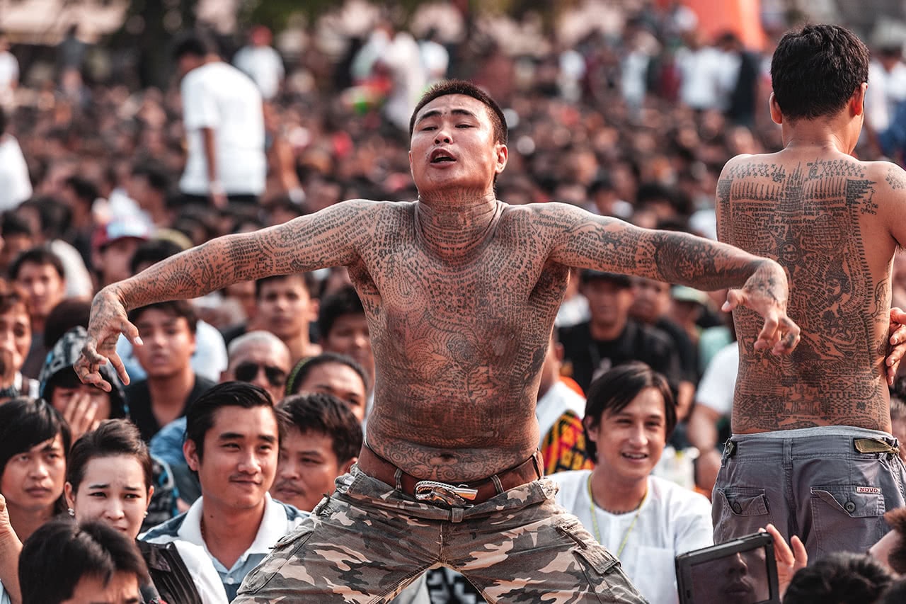 An entranced devotee comes alive at the tattoo festival of Wat Bang Phra, Thailand.